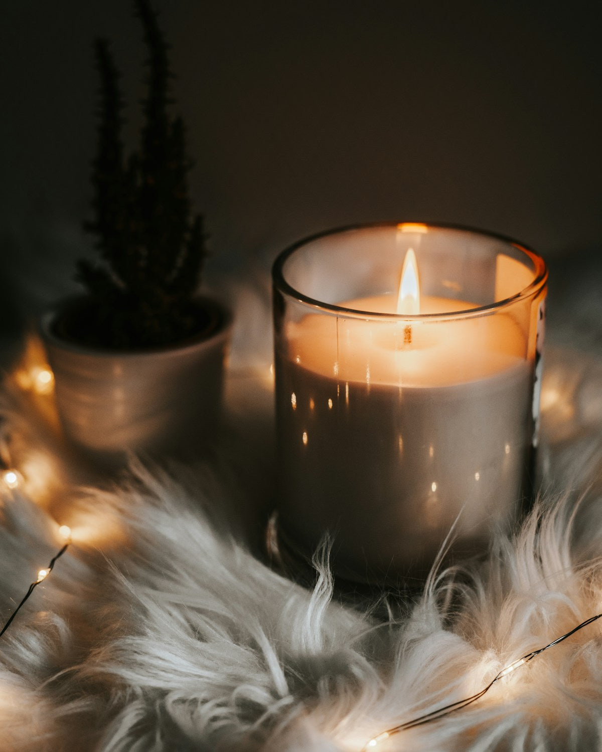 Candle glowing in the dark
